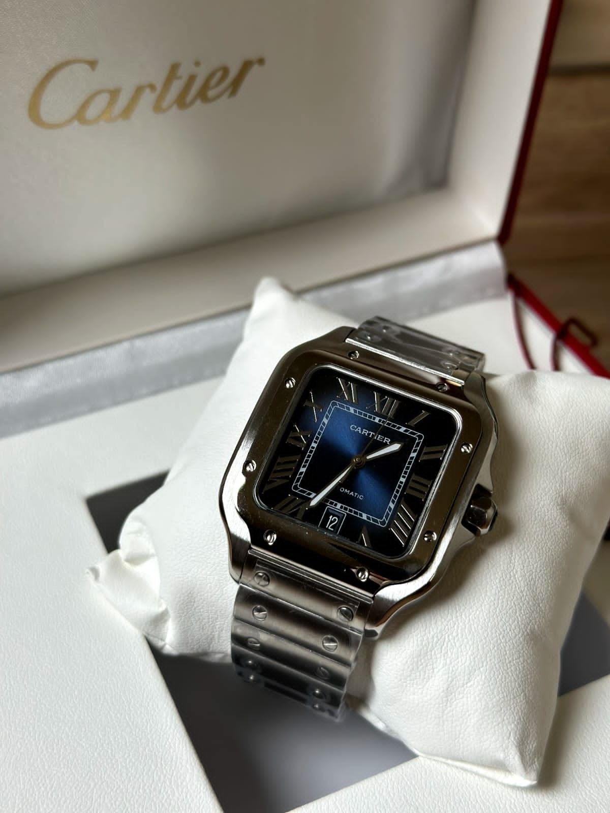 Cartier SANTOS de Cartier grand modèle fond bleu