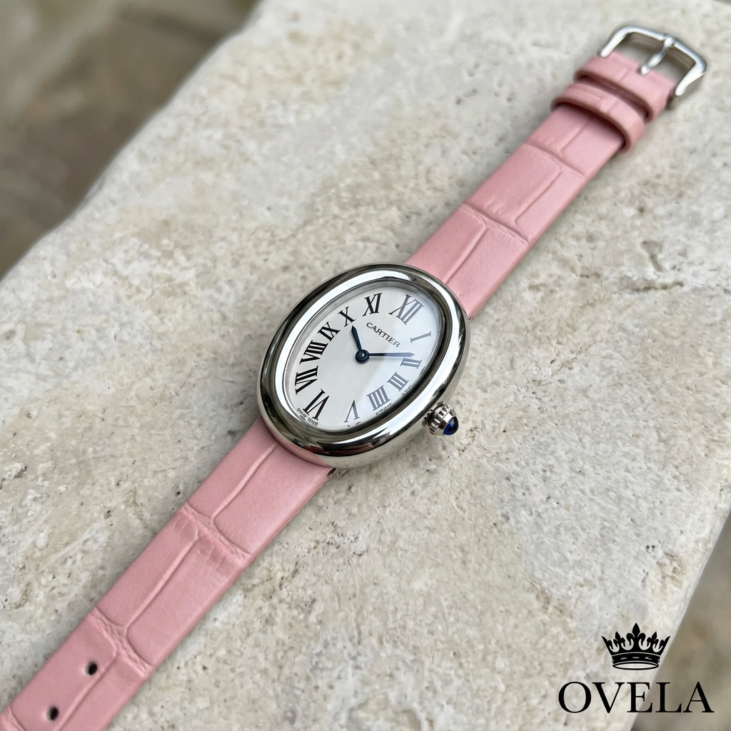 Montre à bracelet rose sur pierre claire